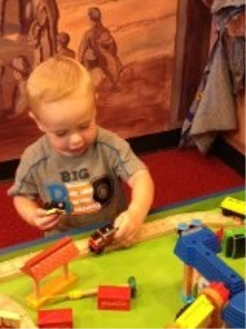 This is my son playing with the trains at the Children's Museum.  He could spend hours there!