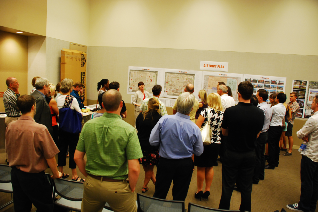 Community and professionals gathered closer to see the drawings being discussed.