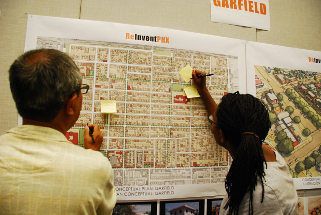 Community members and participants were encouraged to write ideas and concerns on the post it notes and place on presentation boards.