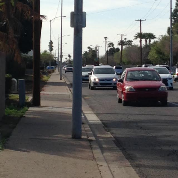 Osborn in Midtown is not pleasant; the narrow sidewalks are next to speeding traffic and the utility poles are barriers.