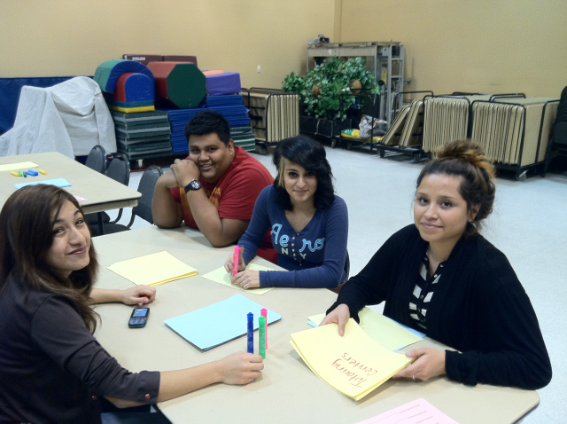 Participants pose for a photo while collaborating on ideas at the PlanPHX event on November 15, 2012 at the Desert West Community Center. 