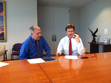 Mayor Stanton works with Jim McPherson to record the new voicemail greeting for ArtLink; a prize Jim redeemed from the Rewards Store. 