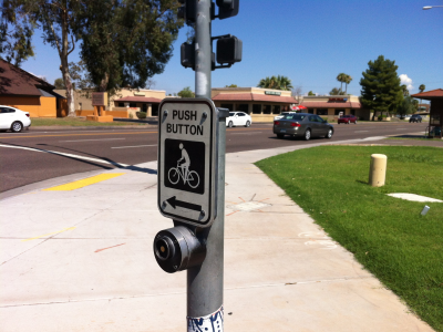 Bicycle Detectors and Buttons at Signaled Intersections