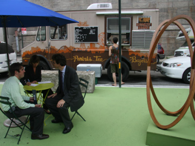 Turn Parking Lots into Public Spaces and Shops Along Central.