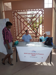 PlanPHX staff discussing ideas with a community member at the Paradise Valley Health Fair
