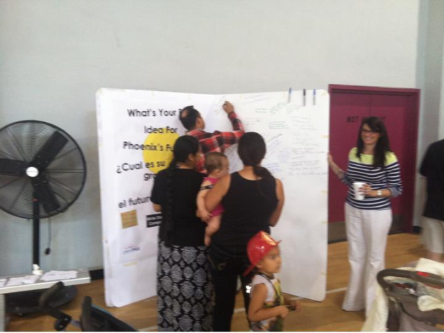Resident's filling out the Big Idea Book at Councilman Simplot's Community Resource Fair at Golden Gate Community Center.  