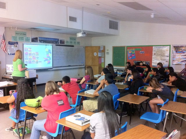 PlanPHX staff presenting to students at Career Day at Cholla MIddle School.  