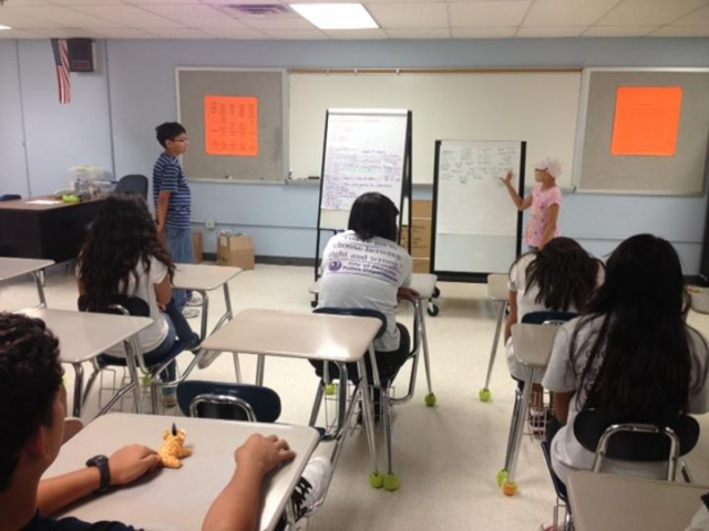 Students in Atkinson Middle School's Wake Up summer program present their Big Ideas