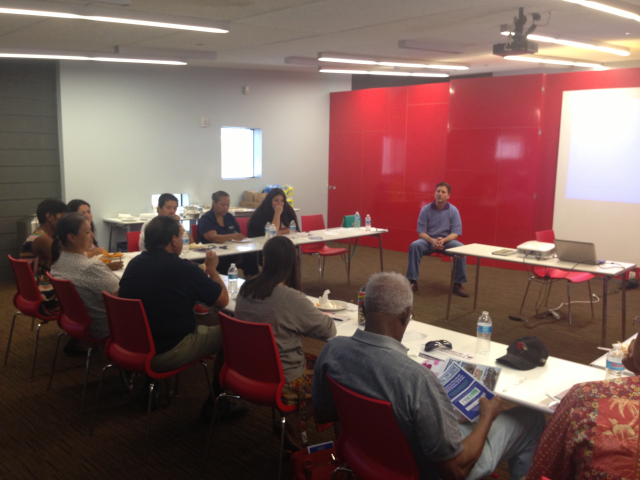 Mayor Stanton sits down to talk about PlanPHX with community members during a tour of Central City South.