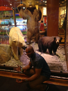 Enjoying a rare squat with the bears at Discovery Place. 