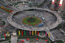 Pedestrian roundabout in Shanghai (http://bit.ly/lujiazui). It can function as a walking trail or viewing deck as well.