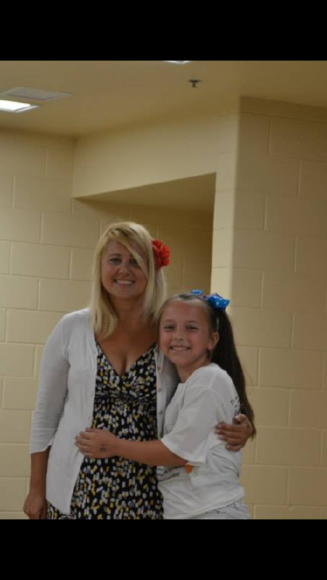 Mrs. Pundsack with one of the many students she inspires everyday. I think the smiles on their faces says it all.