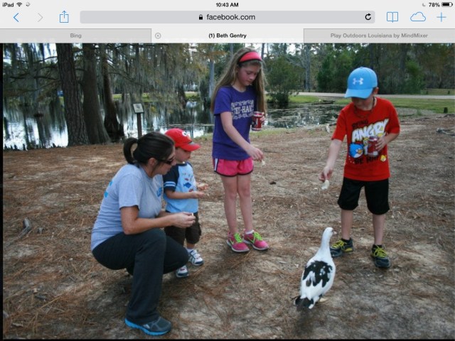 Feeding ducks at Sam Houston Jones State Park