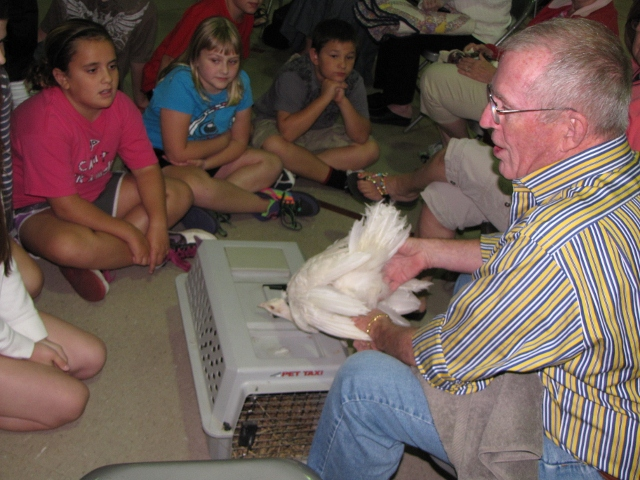 Grandparents have all sorts of hobbies! Ezra Elementary fifth graders learn about quilting, photography, even raising peacocks.