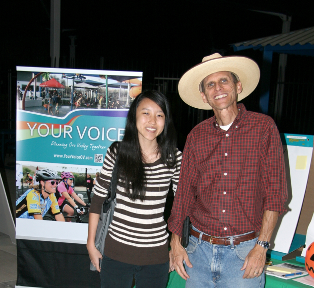 Your Voice Volunteer Joyce Cao and Bayer Vella at the Halloween Fest at the Aquatic Center on 10/26/13