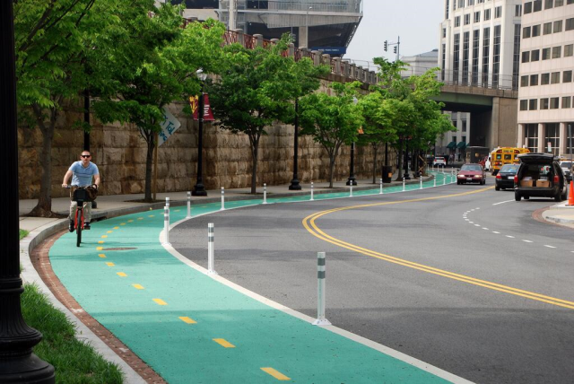 Protected bike lanes!!! Create "spokes" around downtown to bring commuters in via bikes.