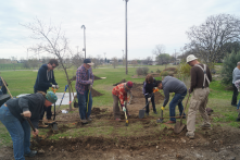 Green Spaces' volunteers working to convert a landscape using LID techniques: Now it retains the rainwater.