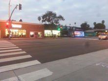 Safe Intersection for Crossing Lincoln: well lit with a traffic signal and clear pedestrian walkways.